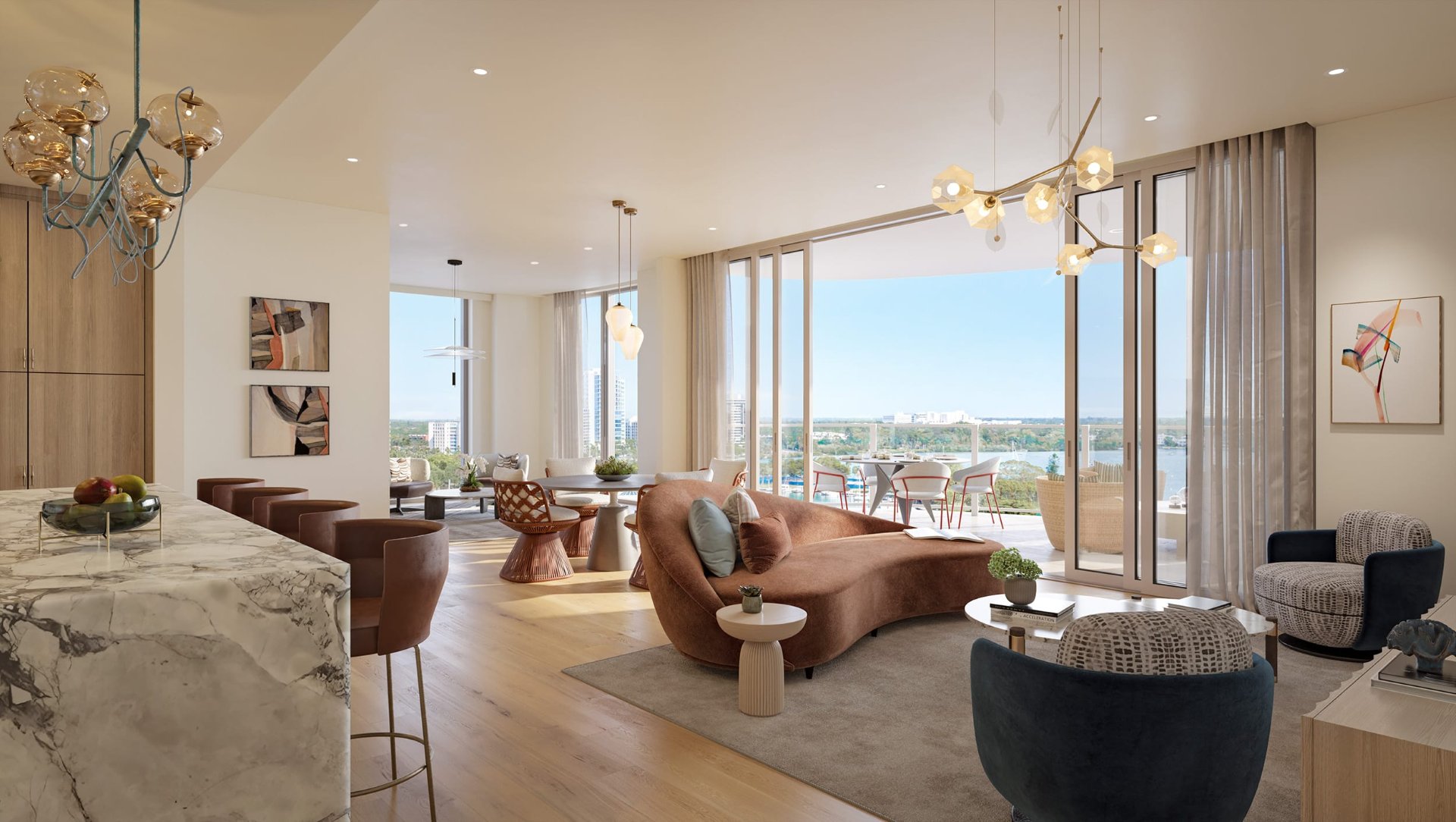 Luxury dining and living area at Amara on Sarasota Bay featuring floor-to-ceiling windows, contemporary lighting, refined furnishings, and views of the marina and downtown Sarasota.