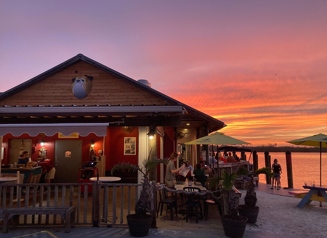 The old salty dog restaurant at dusk. A long-established waterfront favorite with a relaxed marina feel