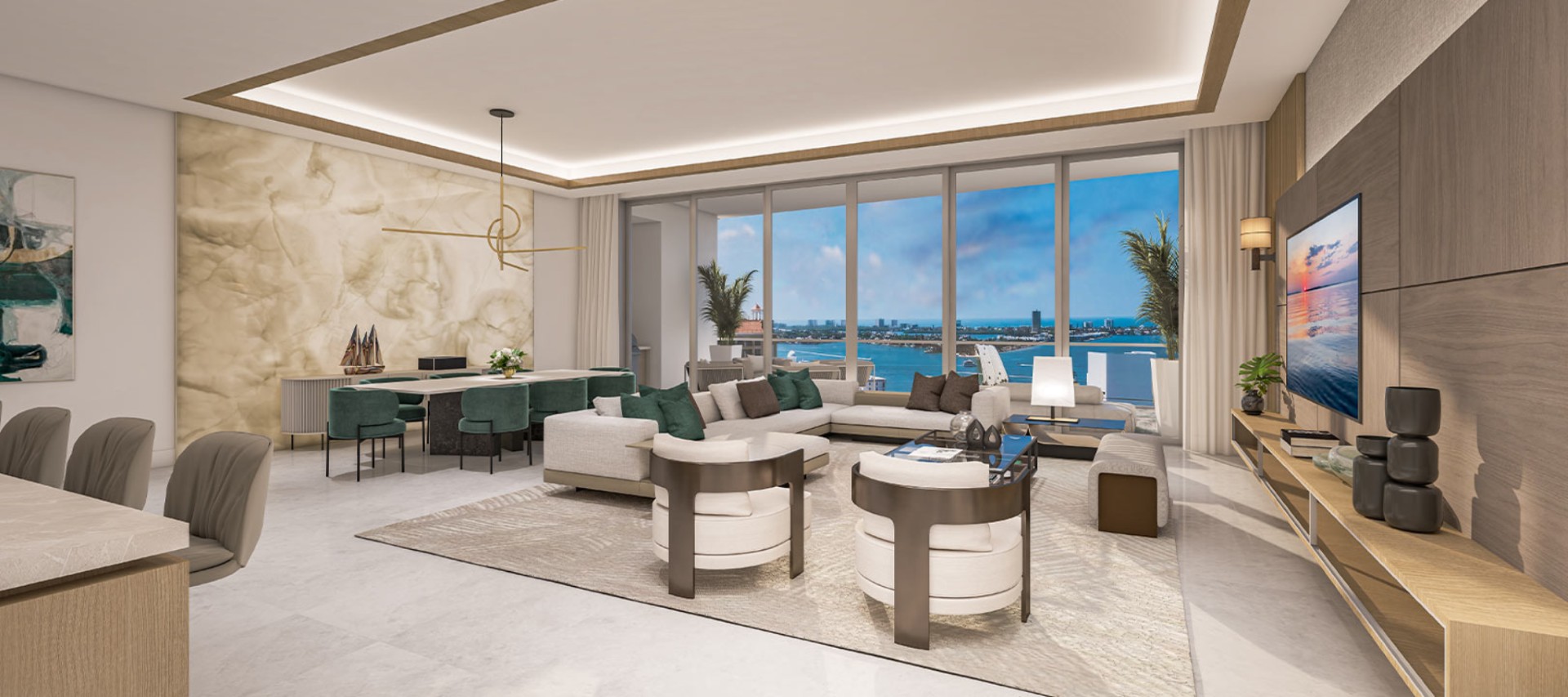 Spacious waterfront living and dining area at The Ritz-Carlton Residences Sarasota Bay featuring refined finishes, modern furnishings, and expansive bay views.