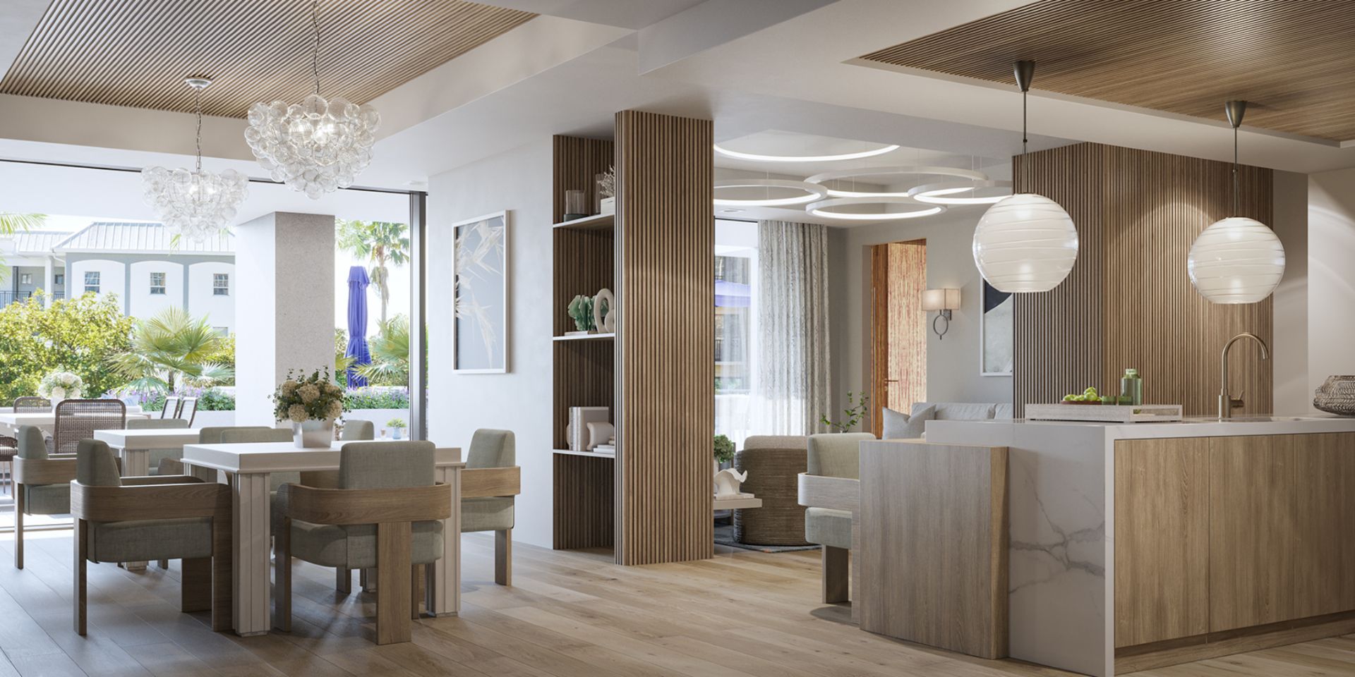 Open-concept social lounge at The Owen Sarasota with modern finishes, dining area, and seamless access to outdoor amenities.