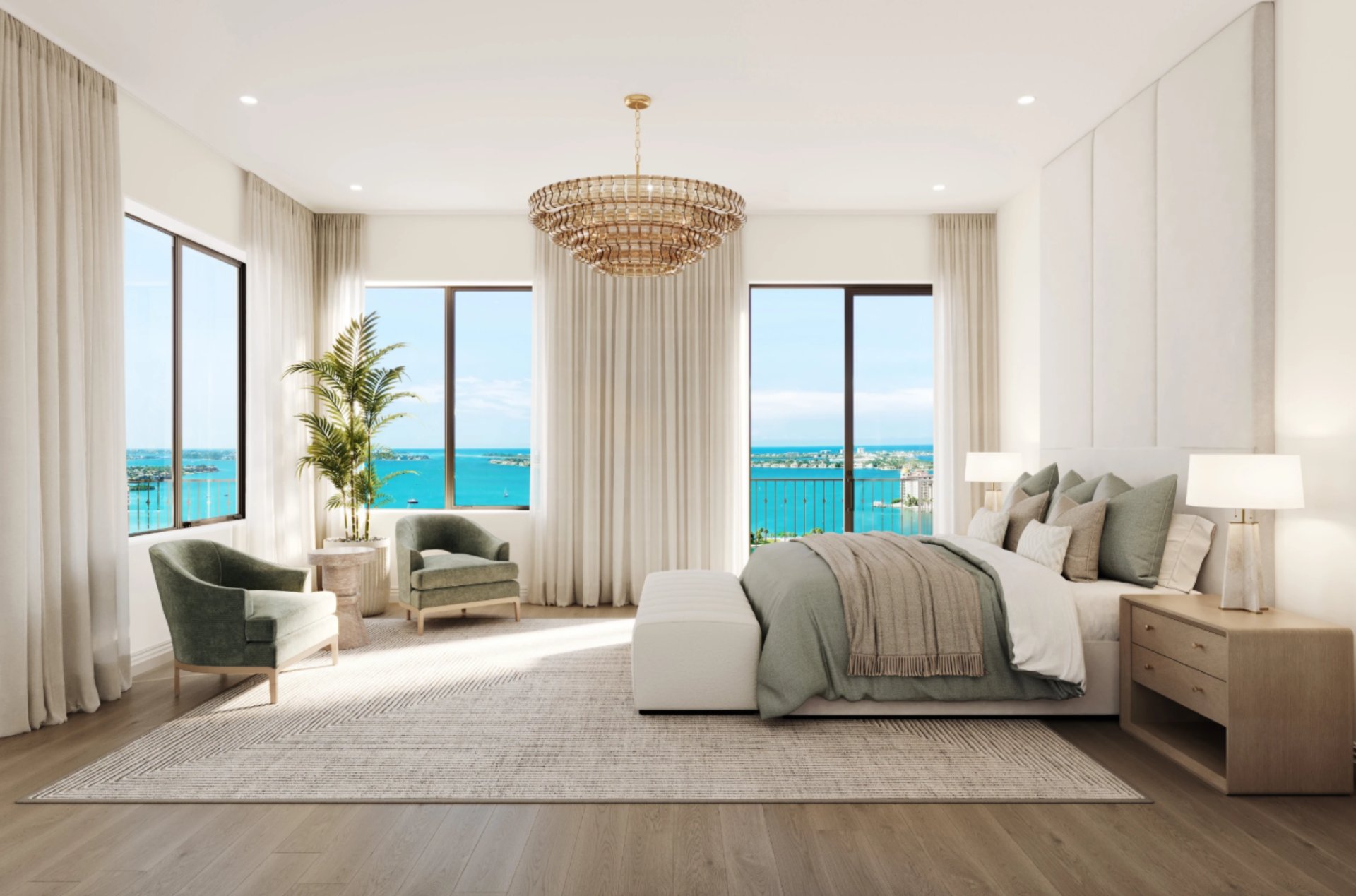 Primary bedroom at Mira Mar Residences Sarasota with large windows, coastal views, soft neutral tones, and luxury furnishings.