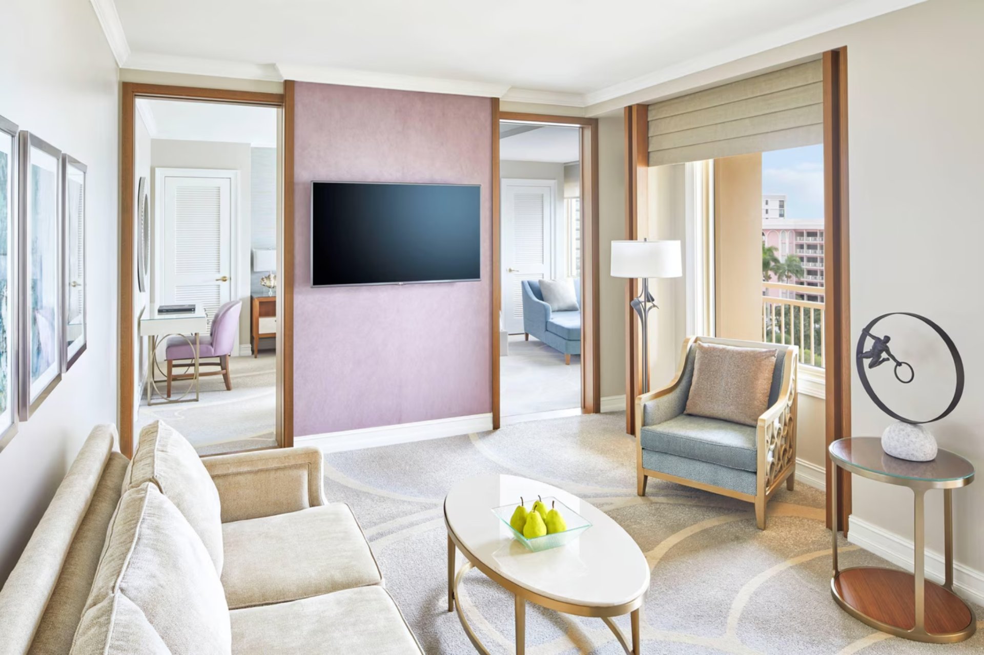 Elegant suite living area with modern furnishings and open layout inside The Ritz-Carlton Sarasota residence