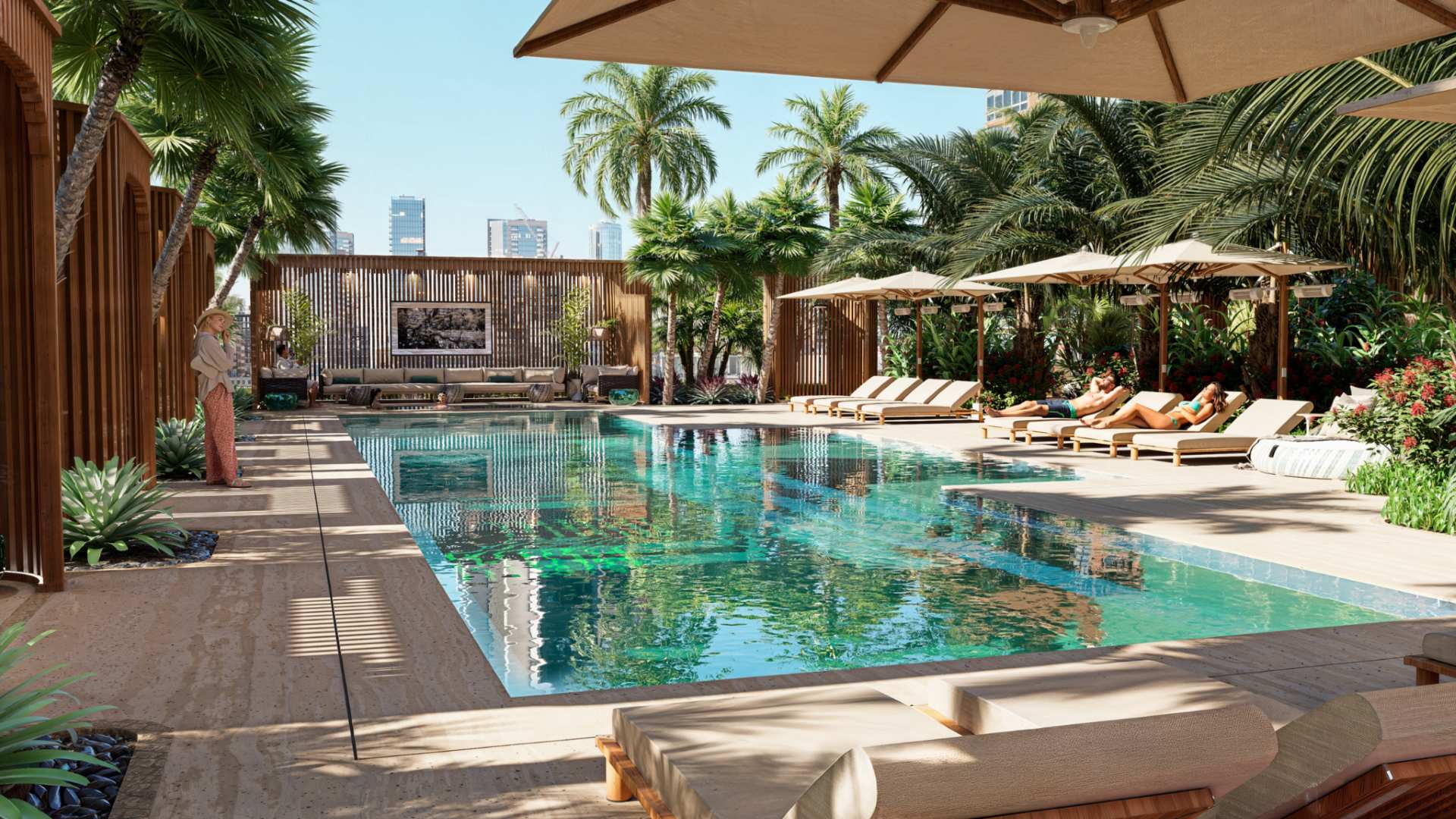 Resort-style swimming pool at Waldorf Astoria Residences Sarasota with lounge chairs, palm trees, private cabanas, and luxury outdoor amenities