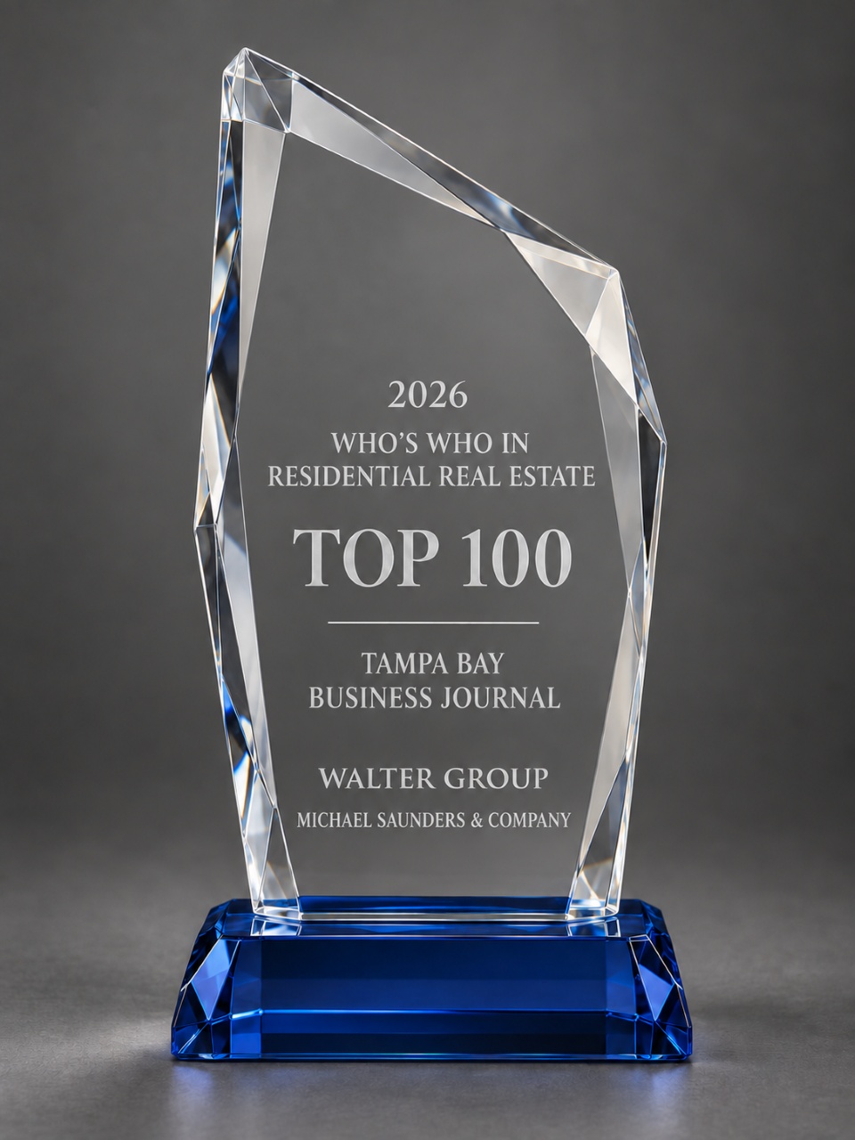 Crystal award recognizing Walter Group of Michael Saunders & Company among Tampa Bay Business Journal’s 2026 Top 100 residential real estate professionals.